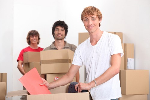 Trained professionals packing items for a move